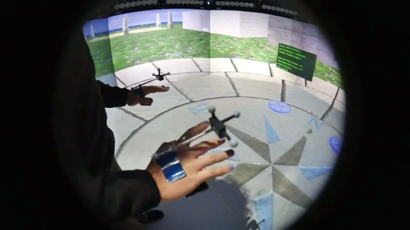 Hand tracking and drone interaction in immersive projected environment